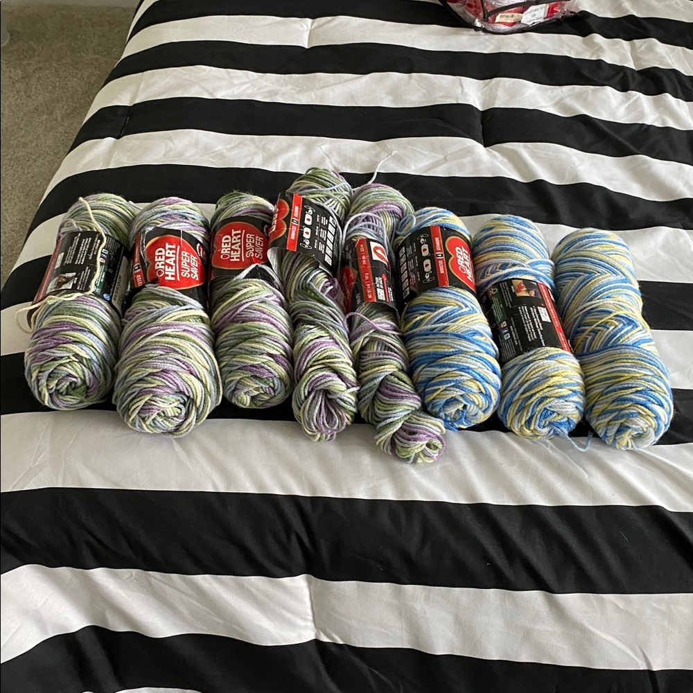 Large lot Red Heart multicolor Super Saver Acrylic Yarn in two color ways.